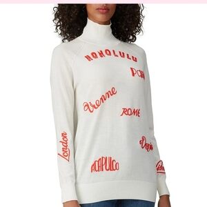 Victoria Beckham Cream Turtleneck Sweater with Orange Script City Names